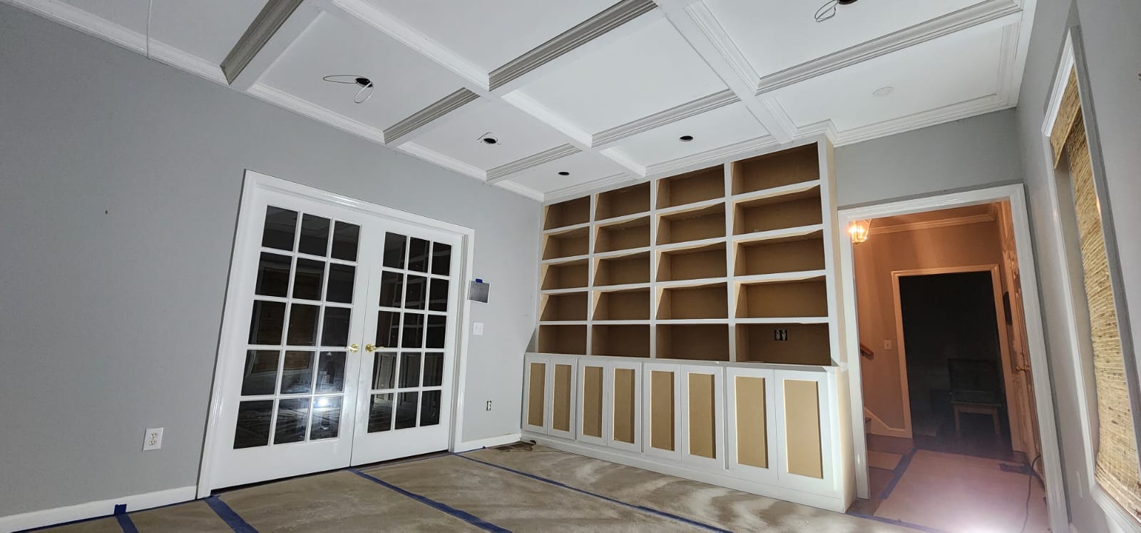 Final built-in wall and coffered ceiling result